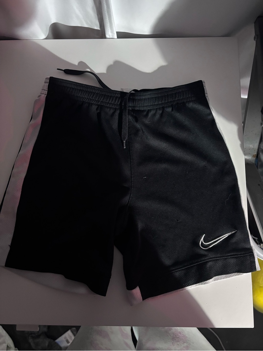 Nike Black Athletic Shorts with White Swoosh
